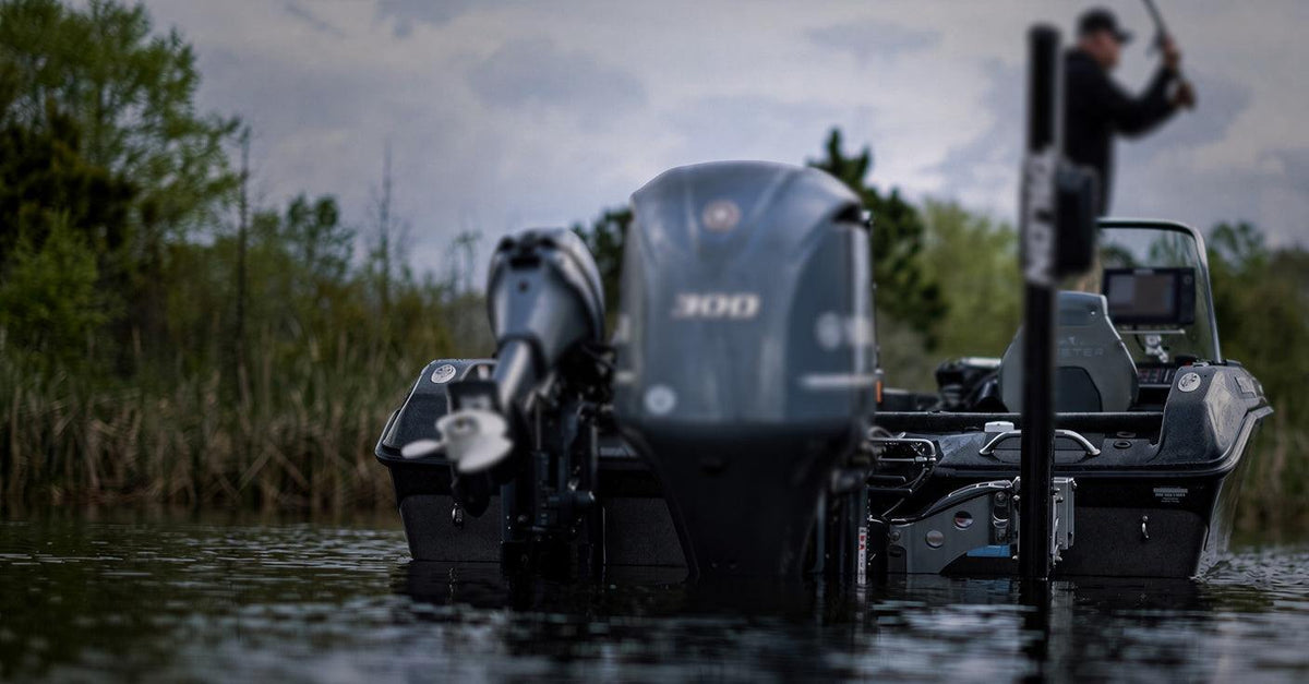 Fantom Liftoff Compatible anchor control system with a black remote and compact components mounted on a fishing boat.